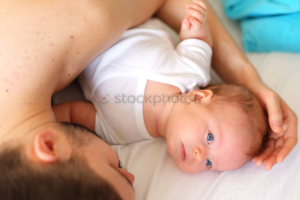 Similar – Image, Stock Photo Mother kissing newborn