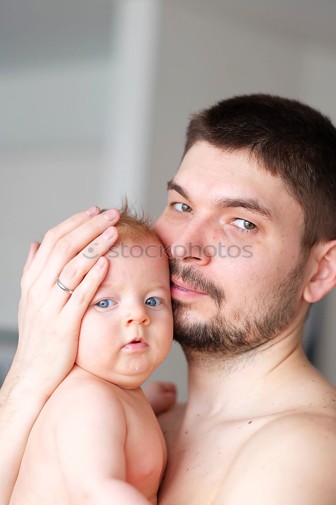 Similar – Image, Stock Photo Father kissing his newborn baby girl.