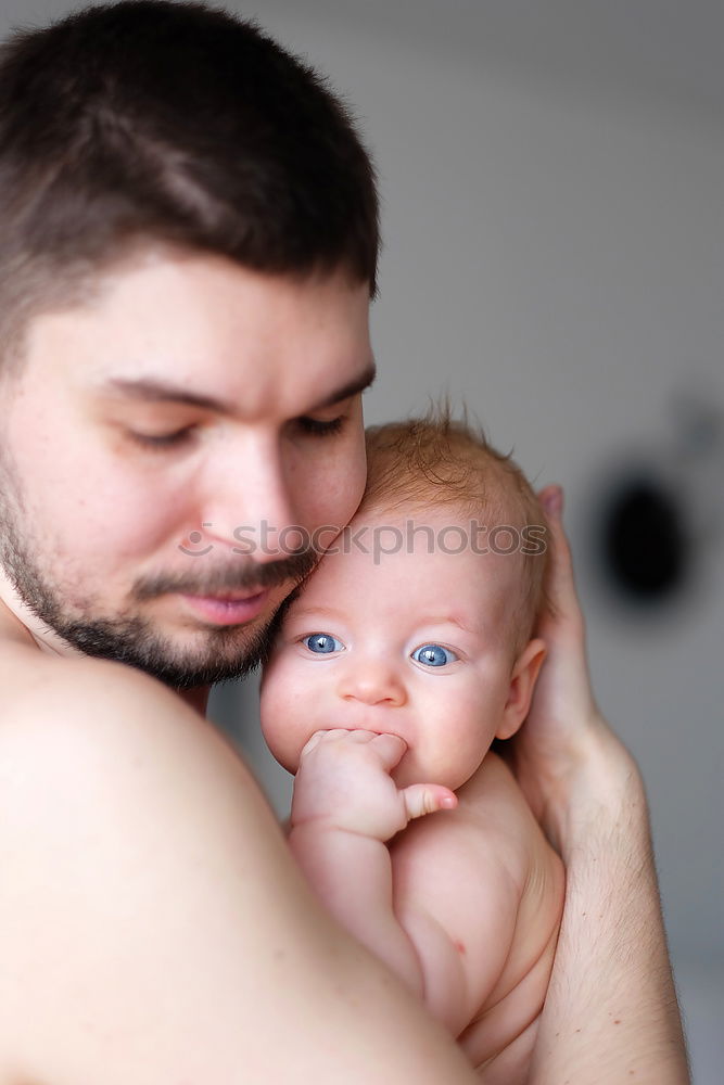 Similar – Image, Stock Photo Father kissing his newborn baby girl.