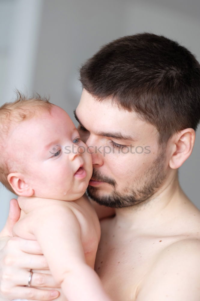 Similar – Image, Stock Photo Father kissing his newborn baby girl.