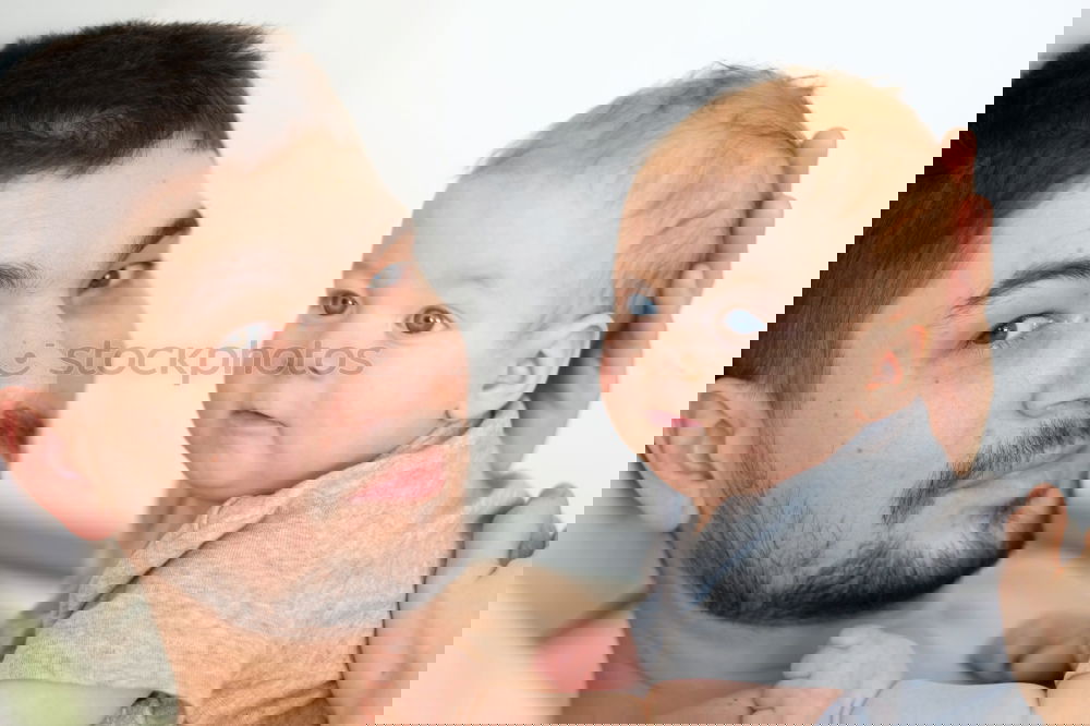 Similar – Image, Stock Photo Father kissing his newborn baby girl.
