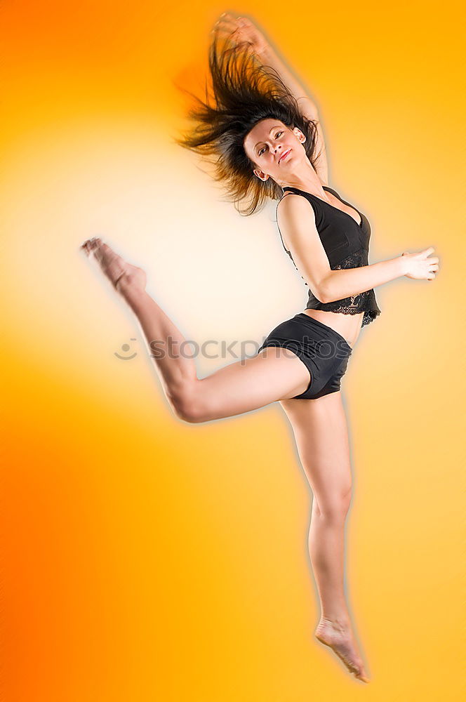 Ballet dancer with leg up