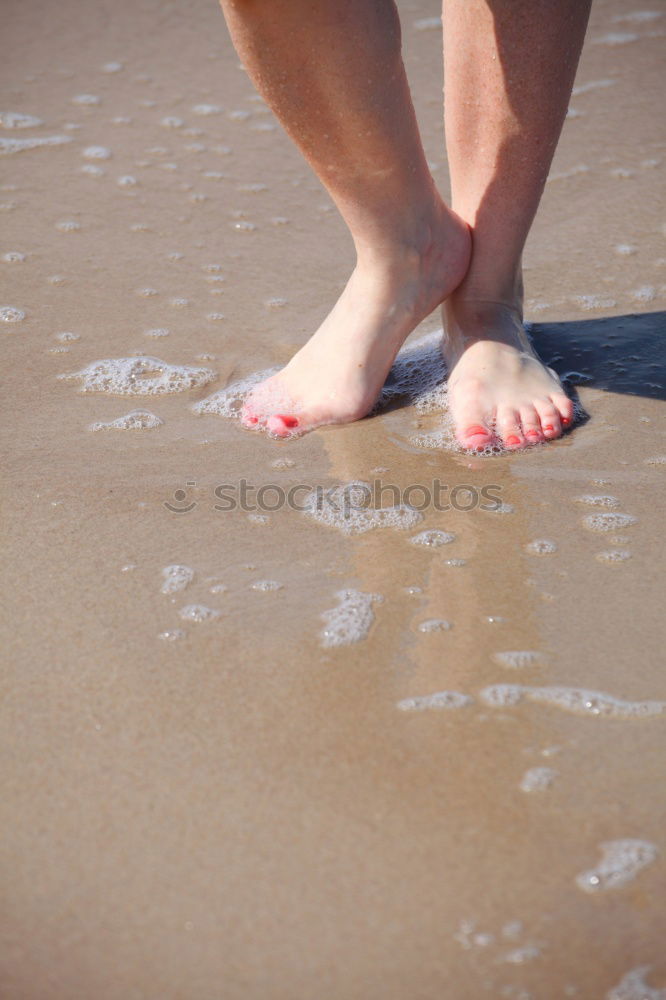 Similar – man takes a beach walk