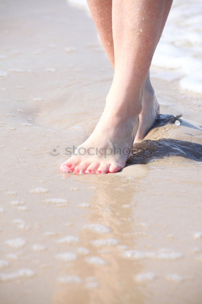 Similar – man takes a beach walk