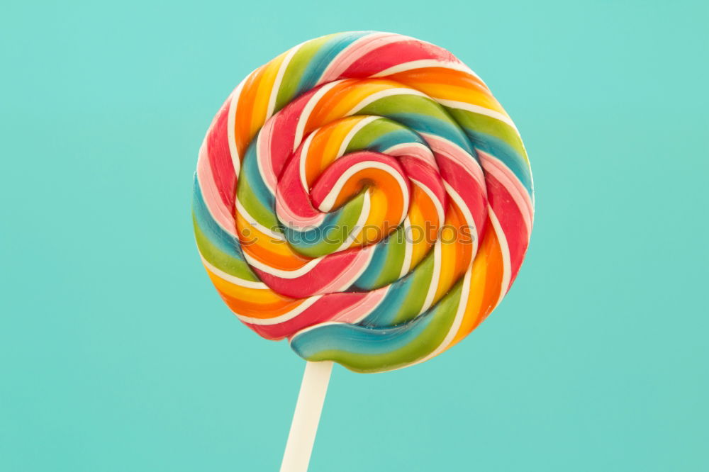 Similar – Colorful lollipops on blue background.