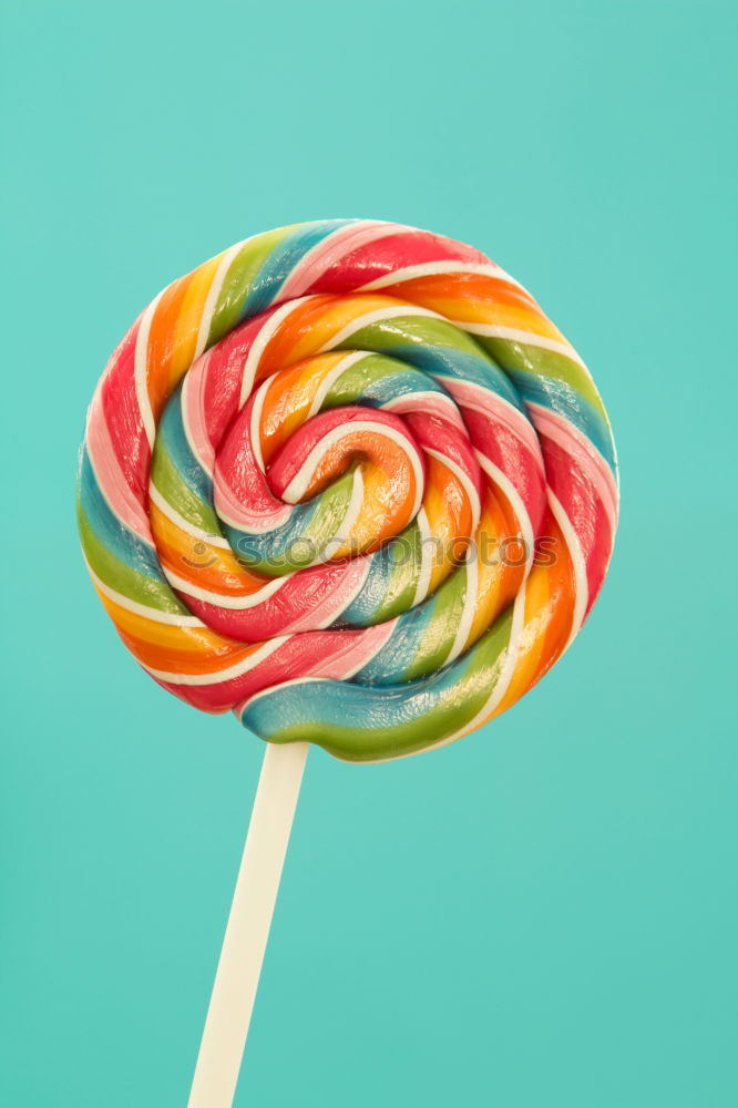 Similar – Colorful lollipops on blue background.