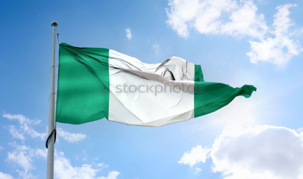 Similar – Nigerian flag in front of blue sky in the wind