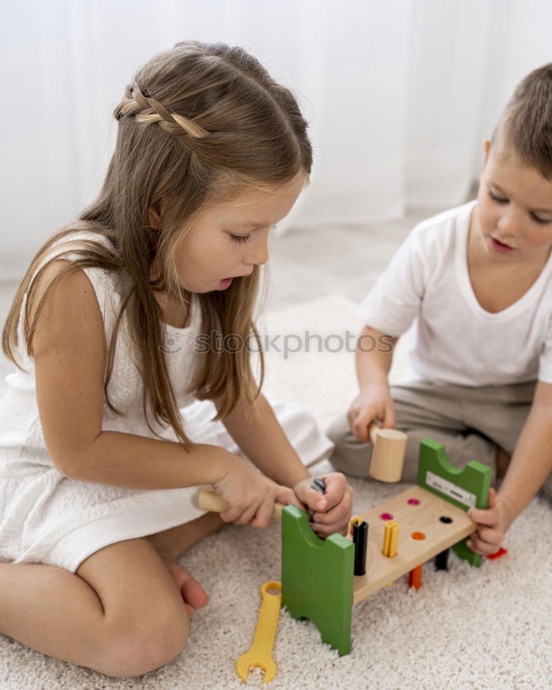 Similar – two beautiful sibling sisters playing at home