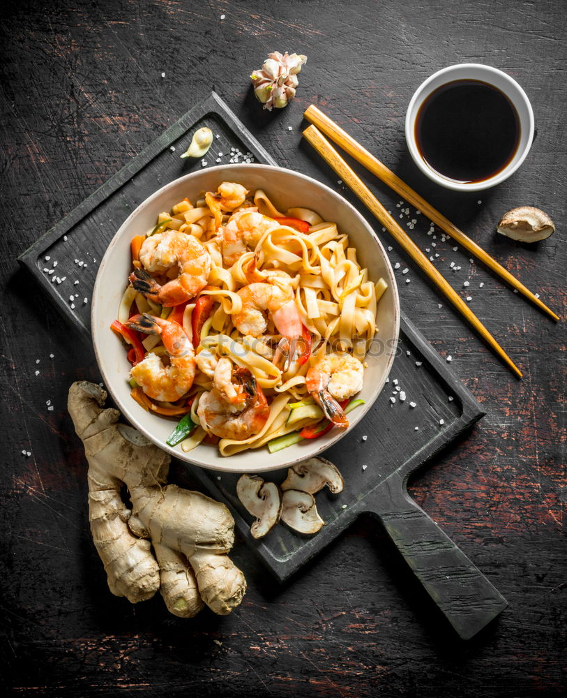 Similar – Image, Stock Photo Asian noodle pan with chicken and vegetables