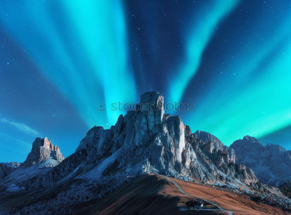 Similar – Norwegian mountain panorama with northern lights