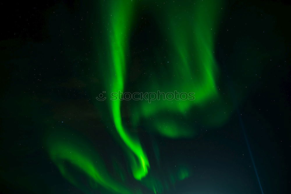 Similar – Image, Stock Photo Green aurora before starry sky and mountain silhouette, Lofoten