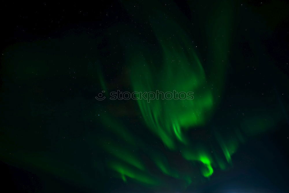 Similar – Image, Stock Photo Green aurora before starry sky and mountain silhouette, Lofoten