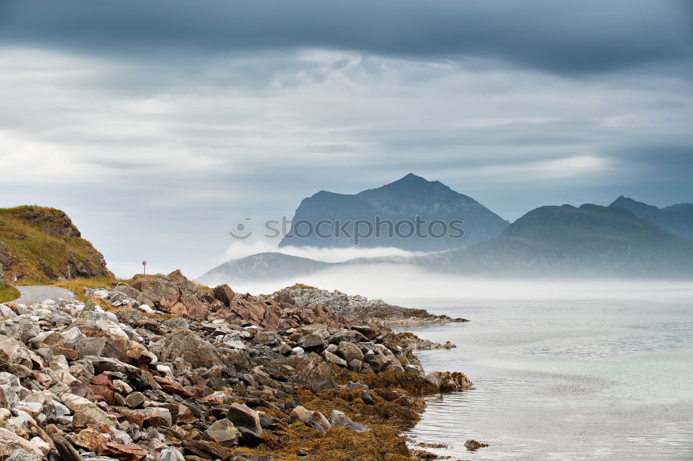 Similar – Rainy atmosphere at the southernmost point of Lofoten with view