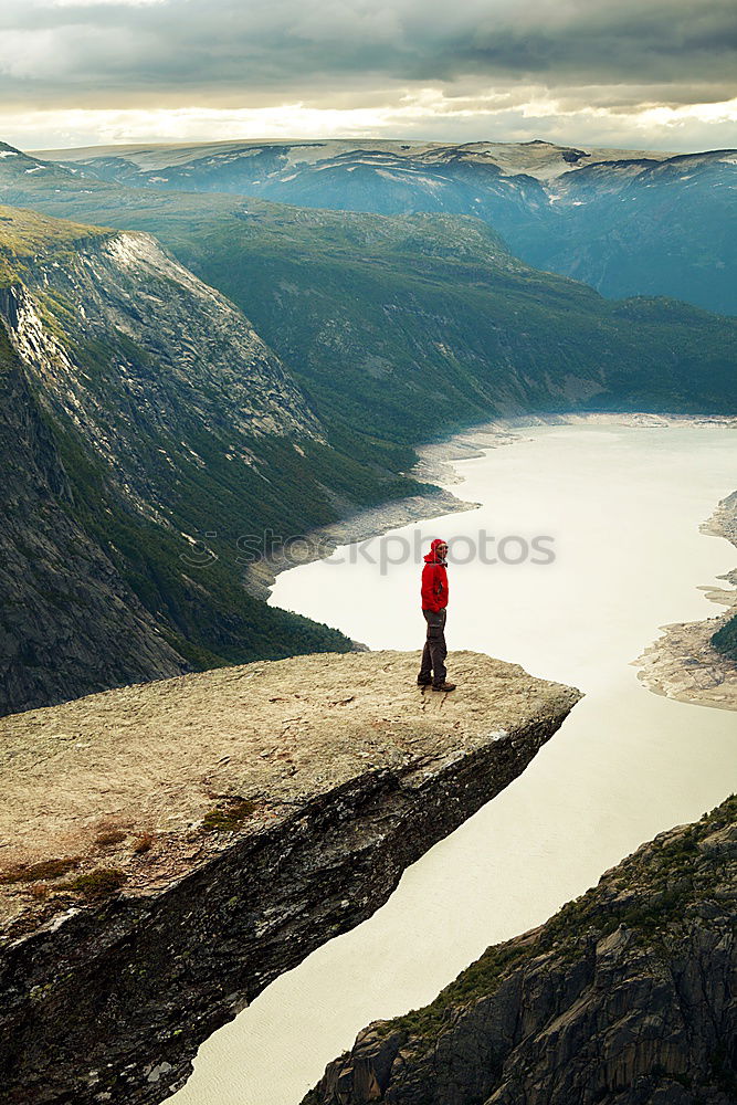 Similar – Image, Stock Photo Boy walking down the mountains