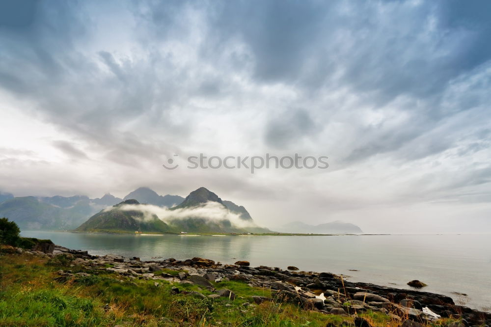 Similar – Summer cloudy Lofoten islands. Norway misty sea