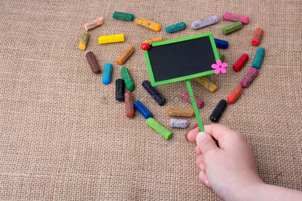Similar – Image, Stock Photo Felt craft smartphone with heart over brown paper
