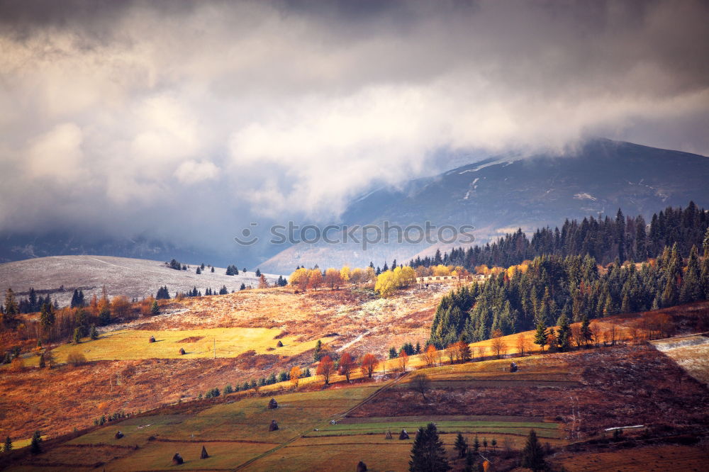 Similar – Malopolska village and green spring meadows on hills