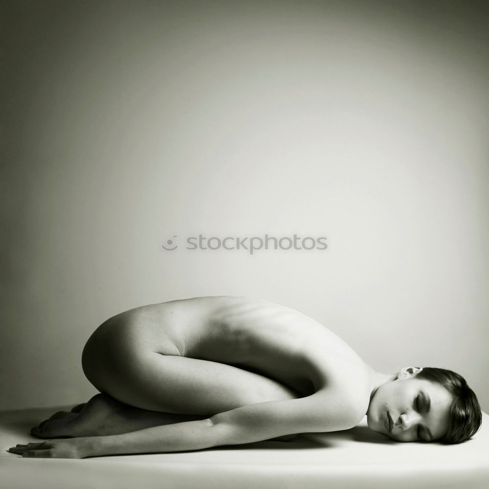 Similar – Analog portrait (35mm) of a young, slim, athletic woman sitting on a couch in her underwear and looking at the camera