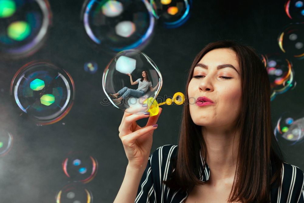 Image, Stock Photo Young caucasian women blowing bubbles