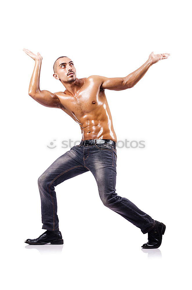 Similar – Fit shirtless young black man doing legs stretching