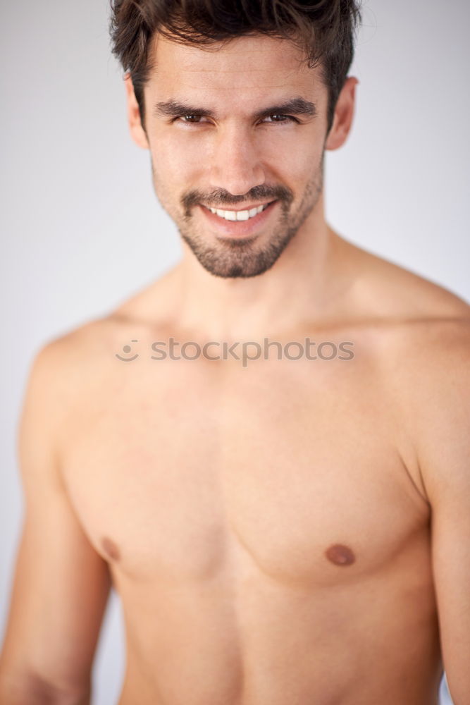 Similar – Young sexy pensive man sitting on bed