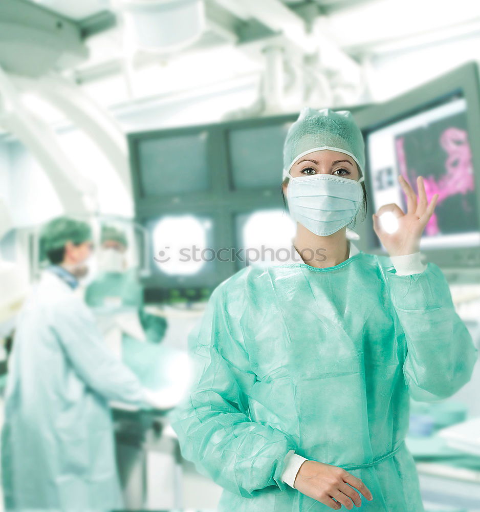 Similar – Image, Stock Photo Team of Surgeons Operating.