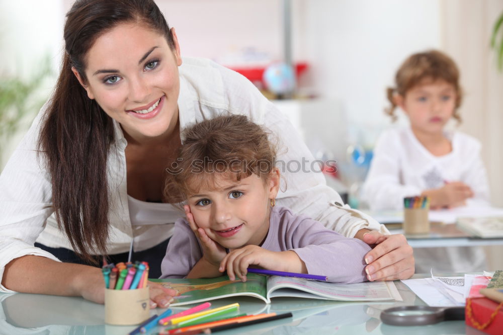 Similar – Image, Stock Photo Mom with little daughter drawing the colorful pictures