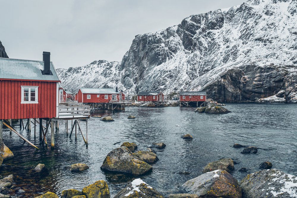 Similar – Small houses on lakeside in mountains