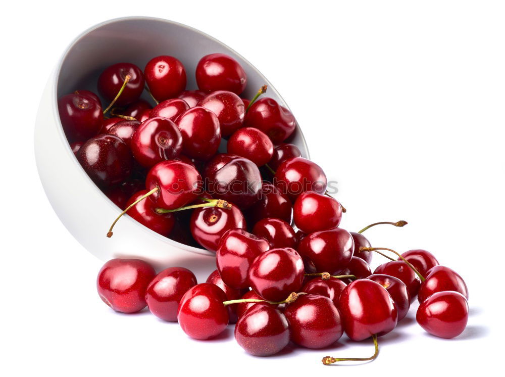 Similar – freshly picked red currants lie in a glass bowl on a red and white chequered tablecloth