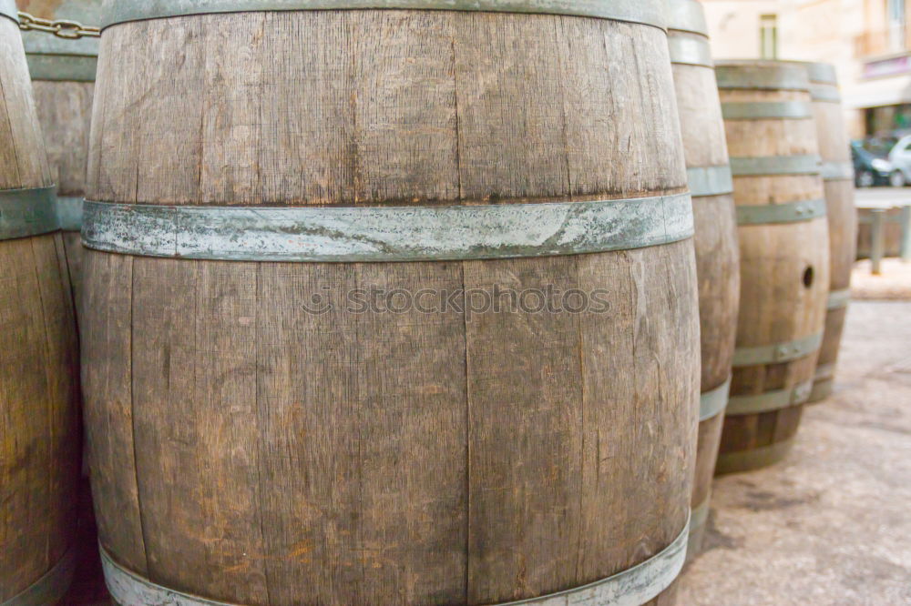 Similar – Image, Stock Photo Wooden barrels on stone surface