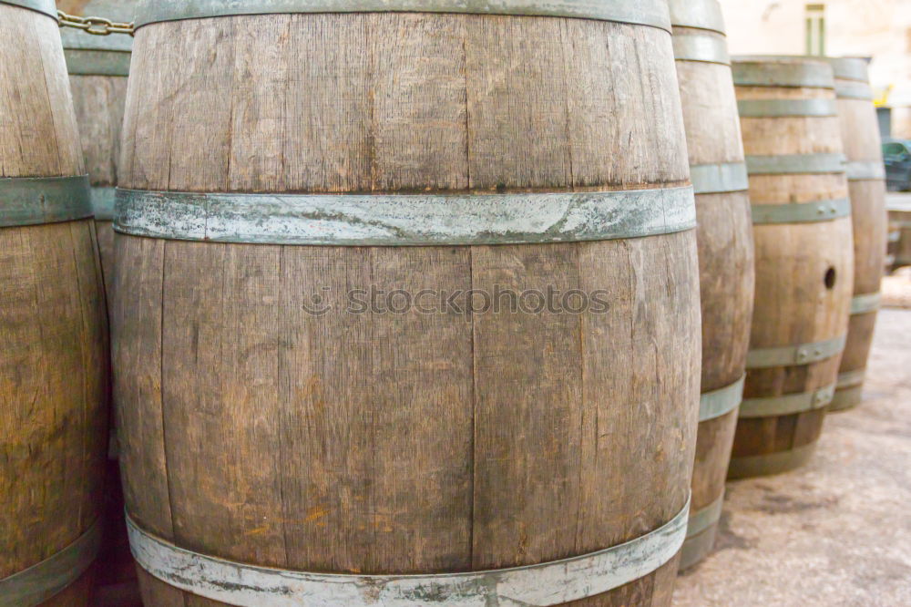 Similar – Image, Stock Photo Wooden barrels on stone surface