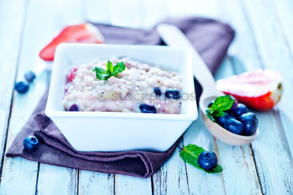 Similar – Image, Stock Photo Muesli with yoghurt and fruits on wood