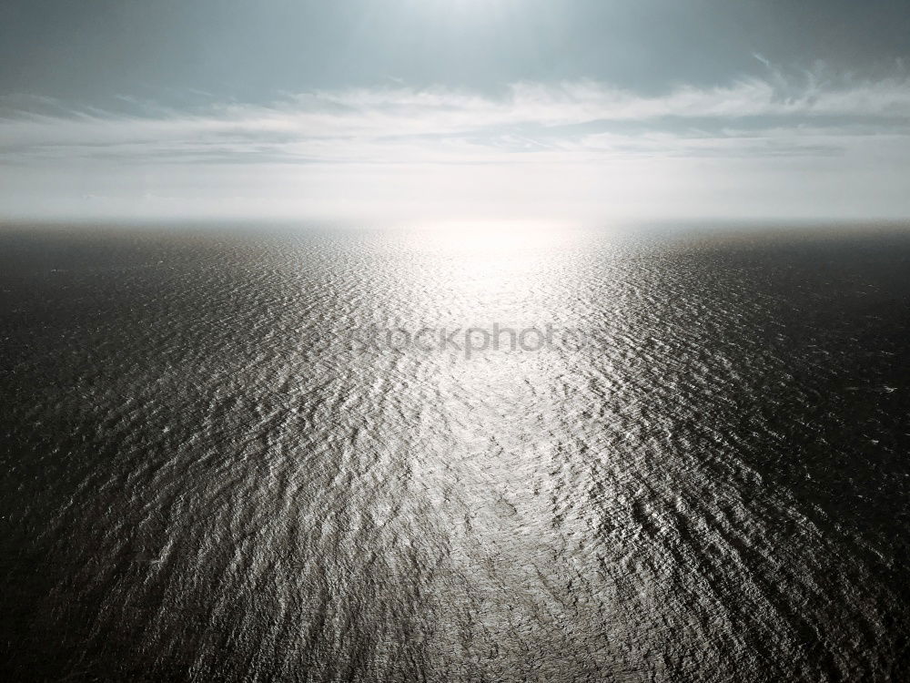 Similar – Image, Stock Photo Rain falls on sea from leaden sky