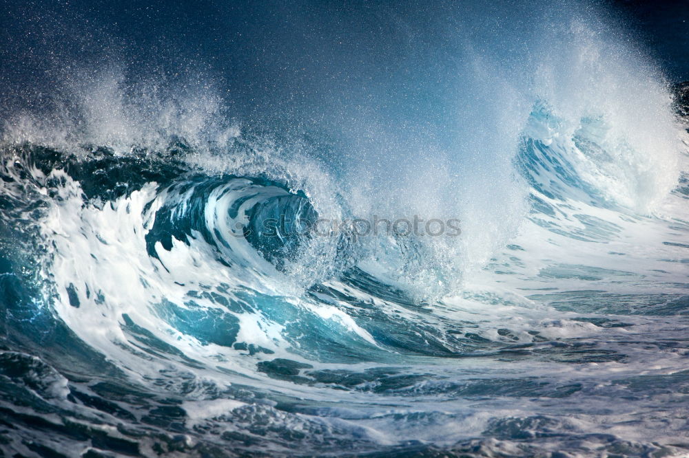 Similar – Rock in the surf Nature