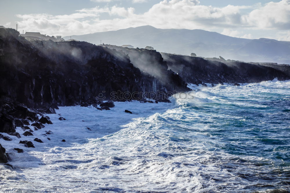 Similar – Image, Stock Photo Foaming surf on rocky coast, blue sky, clouds and high mountains in the background, Queensland / Australia . ,Lookout