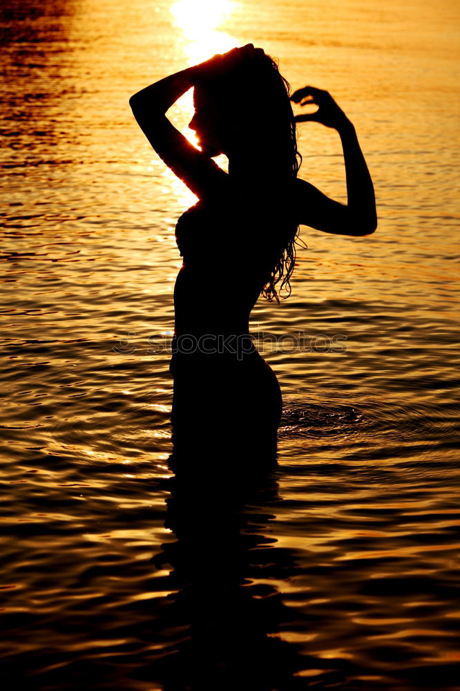 Similar – One happy little boy playing on the beach at the sunset time. Kid having fun outdoors. Concept of summer vacation.