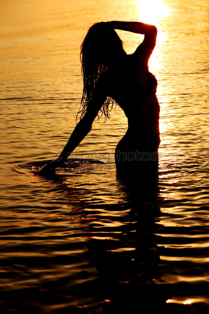 Similar – One happy little boy playing on the beach at the sunset time. Kid having fun outdoors. Concept of summer vacation.