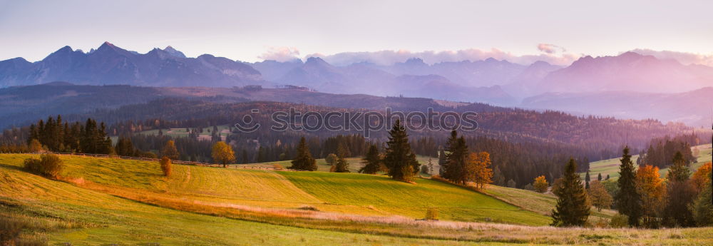 Tatra mountains panorama. Beautiful valley and cloudy sky