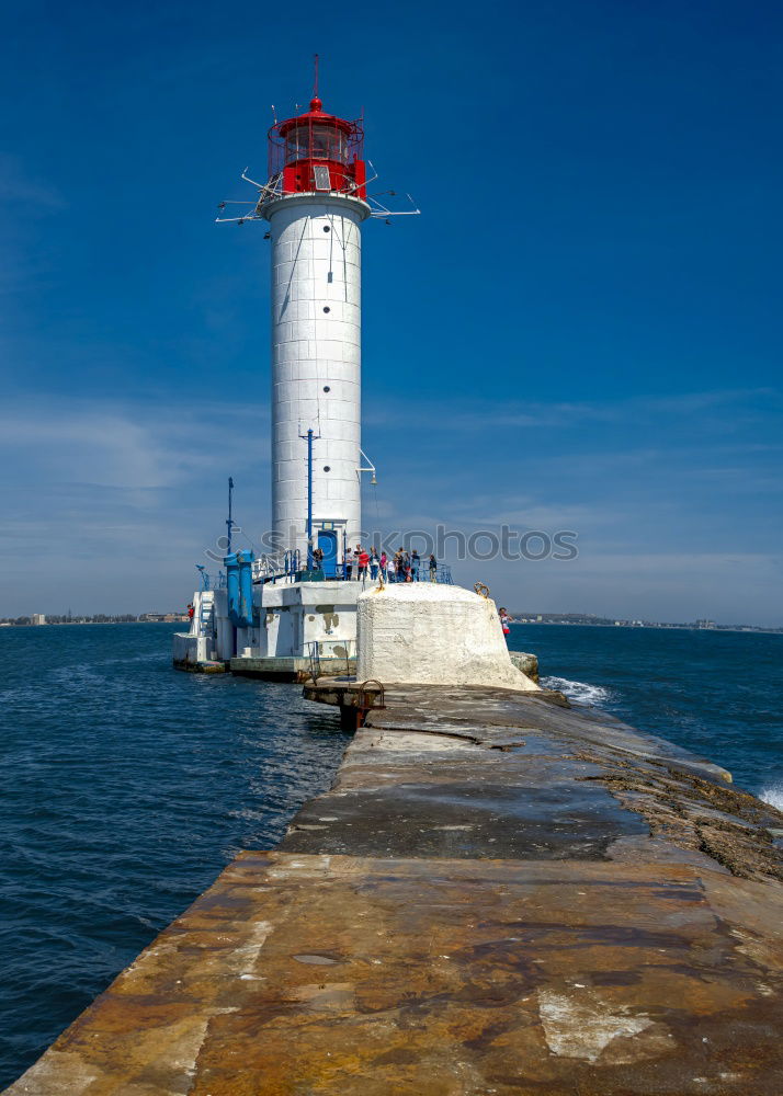 Similar – One lighthouse red-white