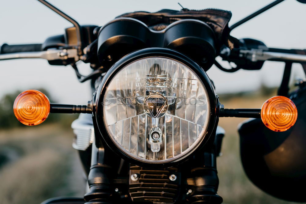 Similar – Man standing near motorcycle