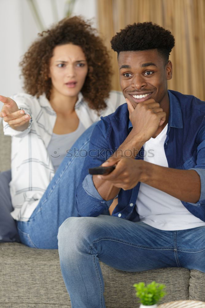 Similar – Image, Stock Photo Portrait of a young thoughtful mixed race man sitting in the sofa