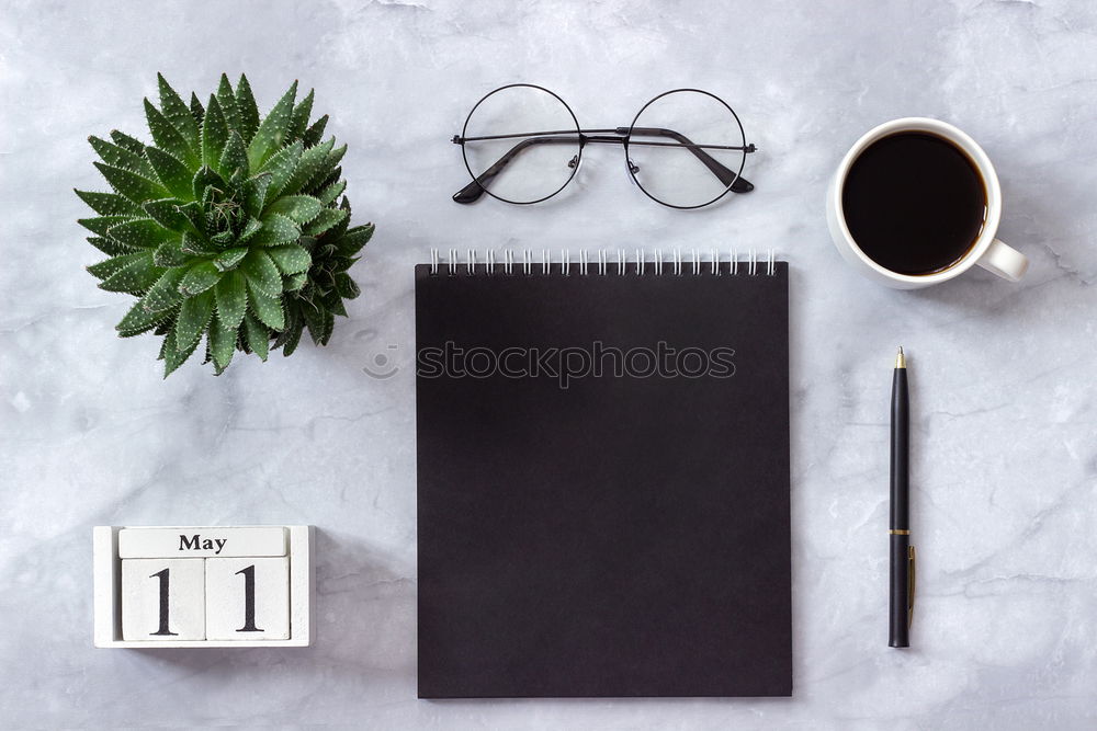 Similar – laptop, notepad, glasses and camera on the wooden desk