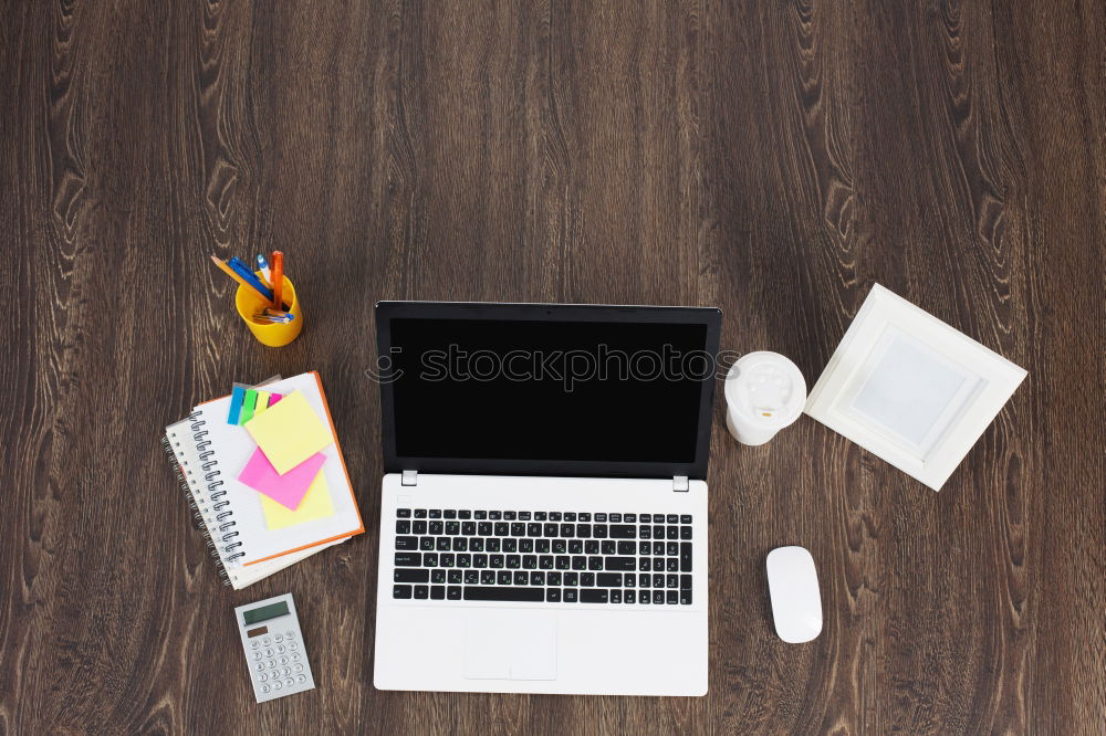 Similar – laptop, notepad, glasses and camera on the wooden desk