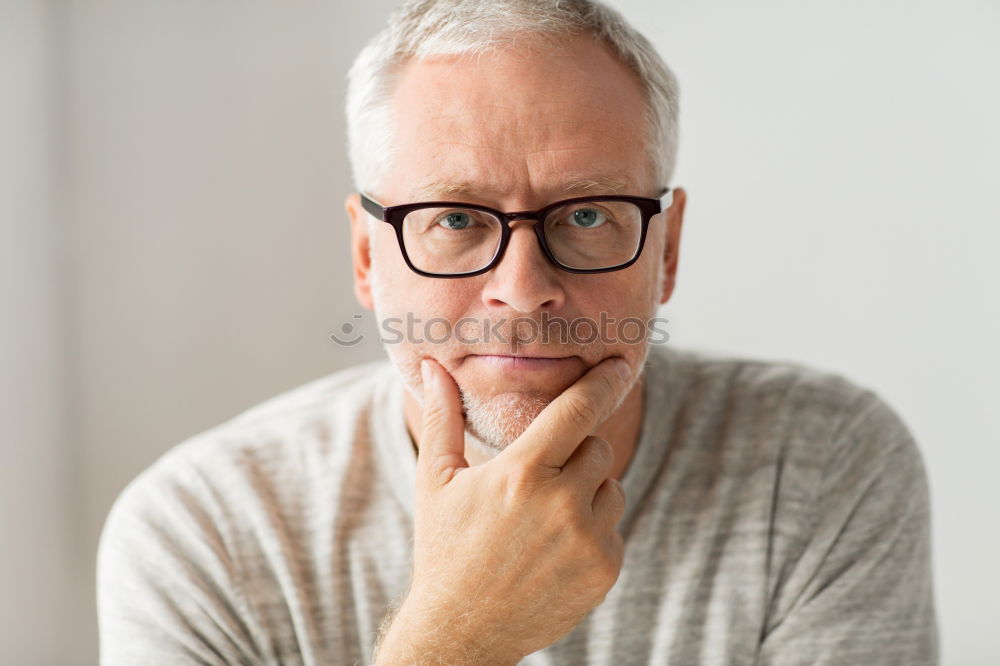 Similar – Determined man with glasses