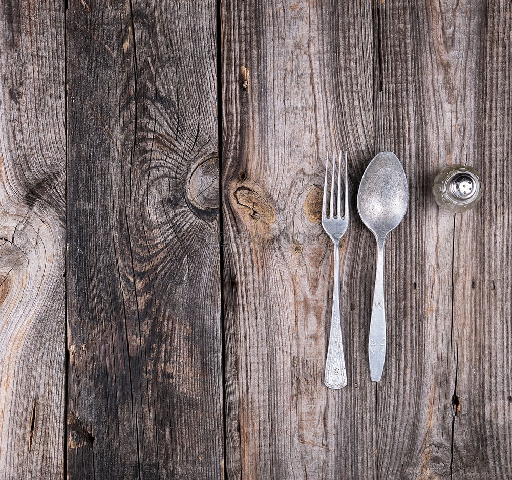 Similar – Image, Stock Photo Empty black cast-iron frying pan with vintage kitchen items