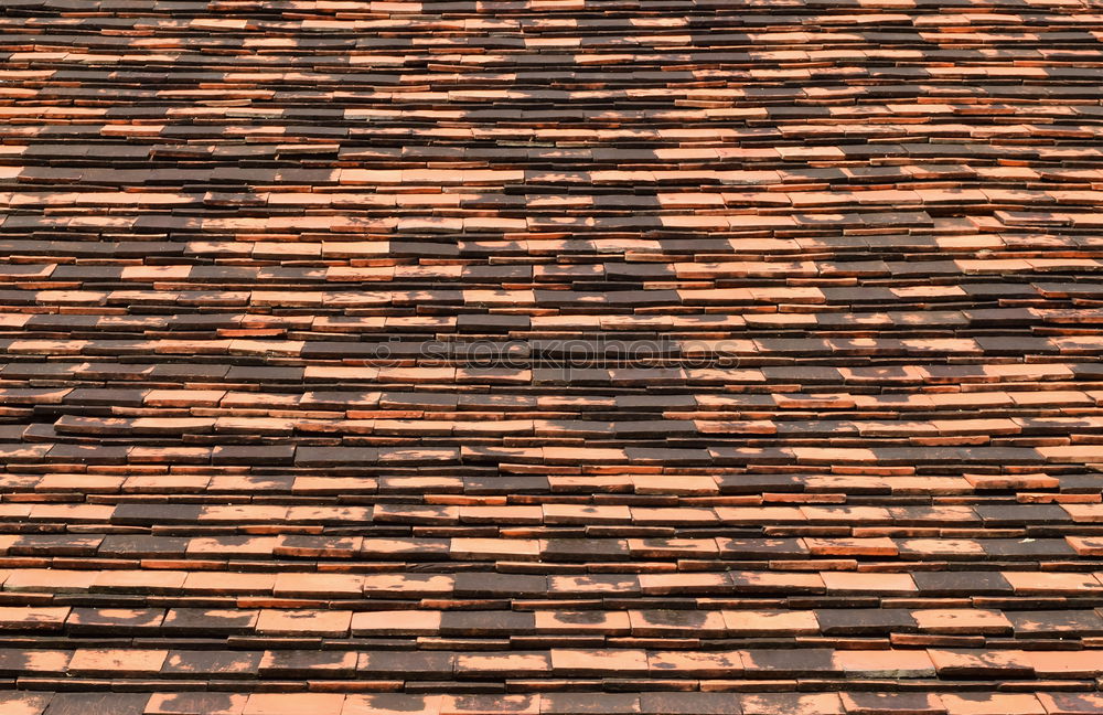 Similar – Old roof tiles on house wall