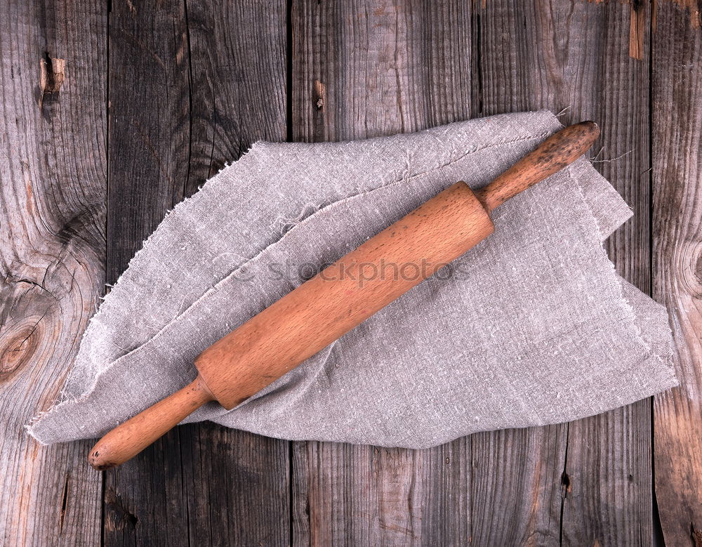 Similar – wooden rolling pin and iron bakeware