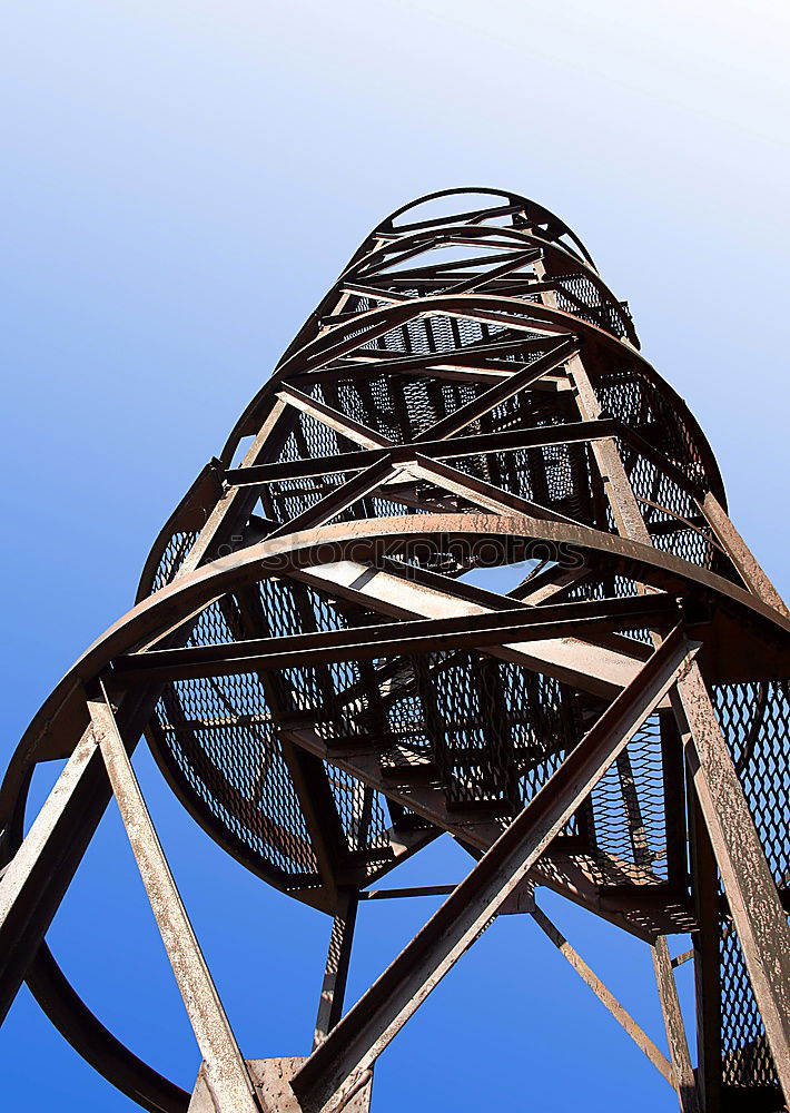 Similar – Power pole from the inside from the frog’s perspective in front of a blue sky