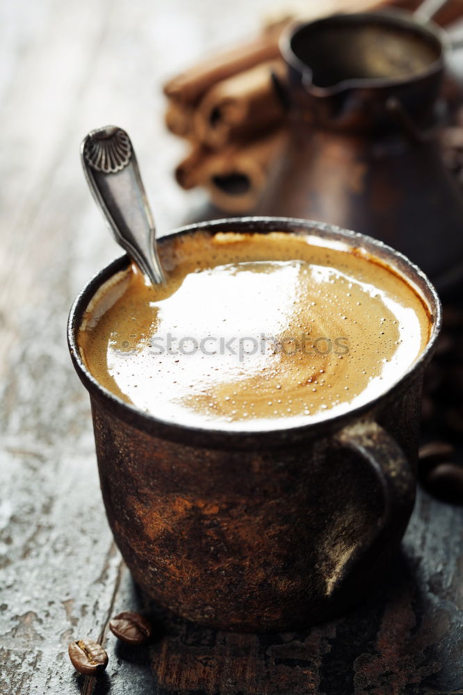 Similar – Cup of coffee on old wooden table with kitchen towel