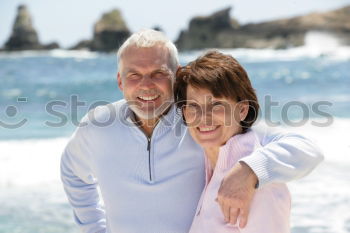 Similar – Image, Stock Photo Senior man and woman having a run along the shore. Scene with sea, sand and trees. Healthy and active way of life